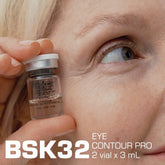 BSK32 Eye Contour Pro serum vial held near eye, 3mL anti-aging eye care treatment